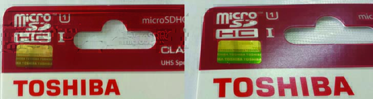 TEM CHỐNG GIẢ CỦA TOSHIBA : nhìn thẳng màu nâu , nhìn nghiêng đổi thành màu xanh